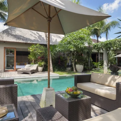Eshara I – Poolside with open door to Eshara II Villa Eshara Complex - Villa Gallery
