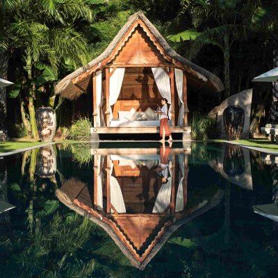 Villa Tiga Puluh Villa Tiga Puluh, a modern tropical villa featuring a private pool, open-air living spaces, lush gardens, and Balinese-inspired architecture for a relaxing stay.