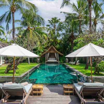 Villa Tiga Puluh Villa Tiga Puluh, a modern tropical villa featuring a private pool, open-air living spaces, lush gardens, and Balinese-inspired architecture for a relaxing stay.