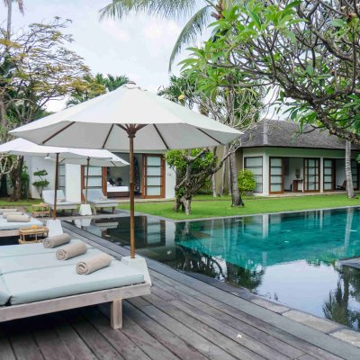 Villa Tiga Puluh Villa Tiga Puluh, a modern tropical villa featuring a private pool, open-air living spaces, lush gardens, and Balinese-inspired architecture for a relaxing stay.