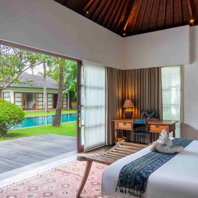 Villa Tiga Puluh Villa Tiga Puluh, a modern tropical villa featuring a private pool, open-air living spaces, lush gardens, and Balinese-inspired architecture for a relaxing stay.