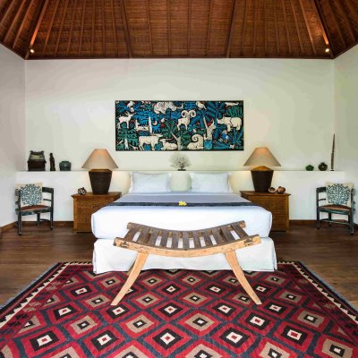 Villa Tiga Puluh Villa Tiga Puluh, a modern tropical villa featuring a private pool, open-air living spaces, lush gardens, and Balinese-inspired architecture for a relaxing stay.