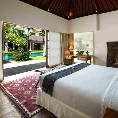 Villa Tiga Puluh Villa Tiga Puluh, a modern tropical villa featuring a private pool, open-air living spaces, lush gardens, and Balinese-inspired architecture for a relaxing stay.