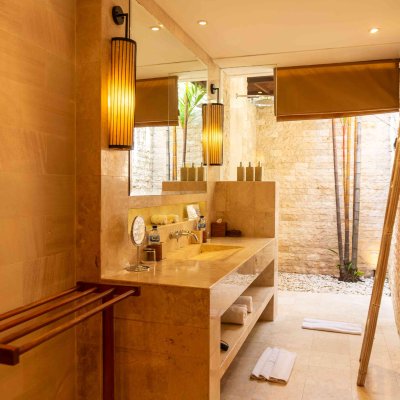 Villa Tiga Puluh Villa Tiga Puluh, a modern tropical villa featuring a private pool, open-air living spaces, lush gardens, and Balinese-inspired architecture for a relaxing stay.