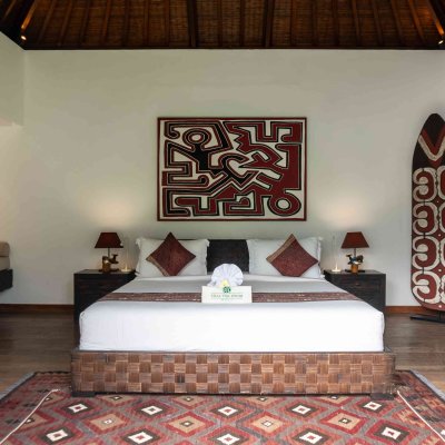 Villa Tiga Puluh Villa Tiga Puluh, a modern tropical villa featuring a private pool, open-air living spaces, lush gardens, and Balinese-inspired architecture for a relaxing stay.