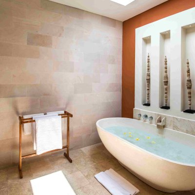 Villa Tiga Puluh Villa Tiga Puluh, a modern tropical villa featuring a private pool, open-air living spaces, lush gardens, and Balinese-inspired architecture for a relaxing stay.