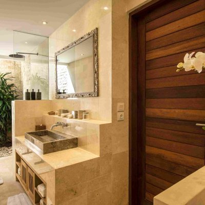Villa Tiga Puluh Villa Tiga Puluh, a modern tropical villa featuring a private pool, open-air living spaces, lush gardens, and Balinese-inspired architecture for a relaxing stay.