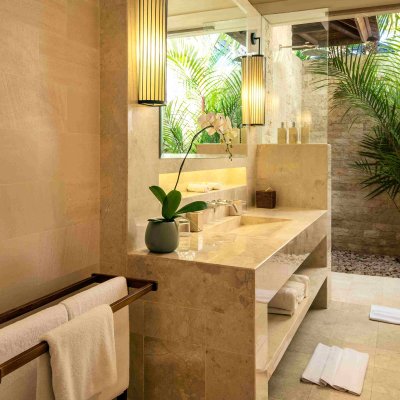 Villa Tiga Puluh Villa Tiga Puluh, a modern tropical villa featuring a private pool, open-air living spaces, lush gardens, and Balinese-inspired architecture for a relaxing stay.