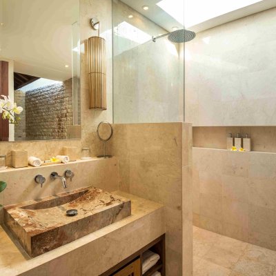 Villa Tiga Puluh Villa Tiga Puluh, a modern tropical villa featuring a private pool, open-air living spaces, lush gardens, and Balinese-inspired architecture for a relaxing stay.