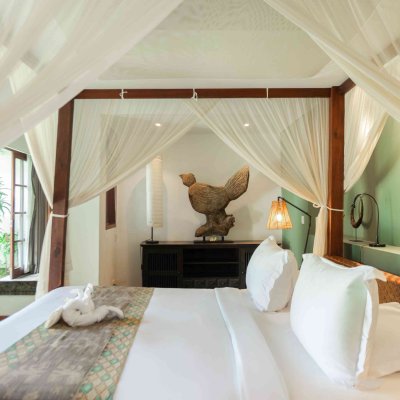 Villa Tiga Puluh Villa Tiga Puluh, a modern tropical villa featuring a private pool, open-air living spaces, lush gardens, and Balinese-inspired architecture for a relaxing stay.