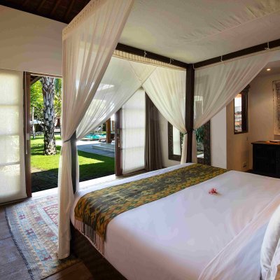 Villa Tiga Puluh Villa Tiga Puluh, a modern tropical villa featuring a private pool, open-air living spaces, lush gardens, and Balinese-inspired architecture for a relaxing stay.