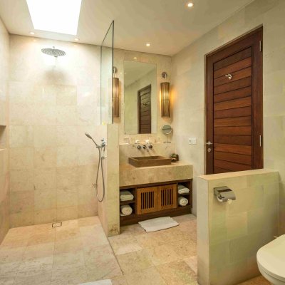 Villa Tiga Puluh Villa Tiga Puluh, a modern tropical villa featuring a private pool, open-air living spaces, lush gardens, and Balinese-inspired architecture for a relaxing stay.