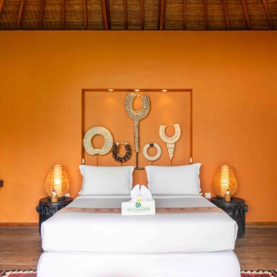 Villa Tiga Puluh Villa Tiga Puluh, a modern tropical villa featuring a private pool, open-air living spaces, lush gardens, and Balinese-inspired architecture for a relaxing stay.