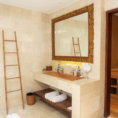 Villa Tiga Puluh Villa Tiga Puluh, a modern tropical villa featuring a private pool, open-air living spaces, lush gardens, and Balinese-inspired architecture for a relaxing stay.