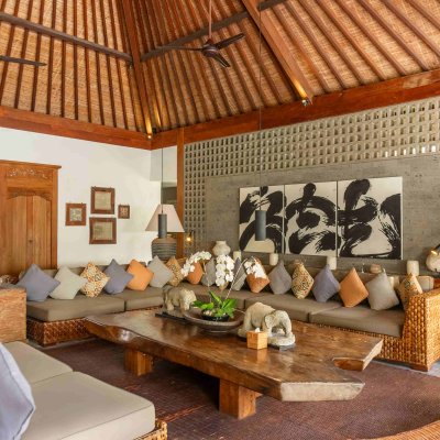 Villa Tiga Puluh Villa Tiga Puluh, a modern tropical villa featuring a private pool, open-air living spaces, lush gardens, and Balinese-inspired architecture for a relaxing stay.