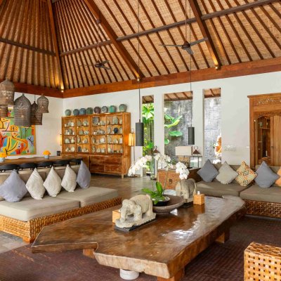 Villa Tiga Puluh Villa Tiga Puluh, a modern tropical villa featuring a private pool, open-air living spaces, lush gardens, and Balinese-inspired architecture for a relaxing stay.