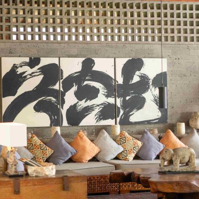 Villa Tiga Puluh Villa Tiga Puluh, a modern tropical villa featuring a private pool, open-air living spaces, lush gardens, and Balinese-inspired architecture for a relaxing stay.