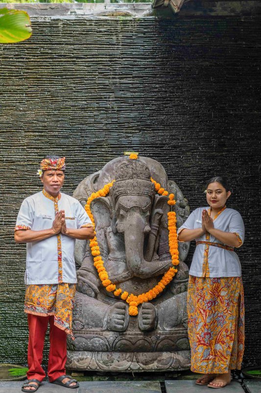 Villa Tiga Puluh, a modern tropical villa featuring a private pool, open-air living spaces, lush gardens, and Balinese-inspired architecture for a relaxing stay.