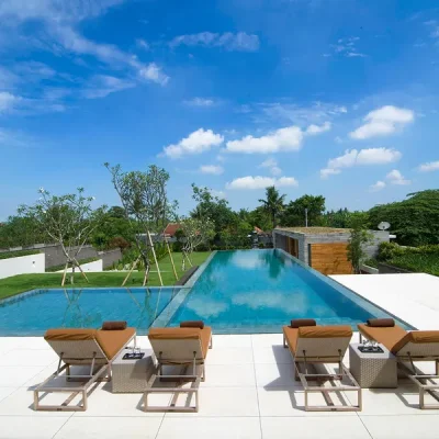 2. The Iman Villa – Sunloungers by the pool