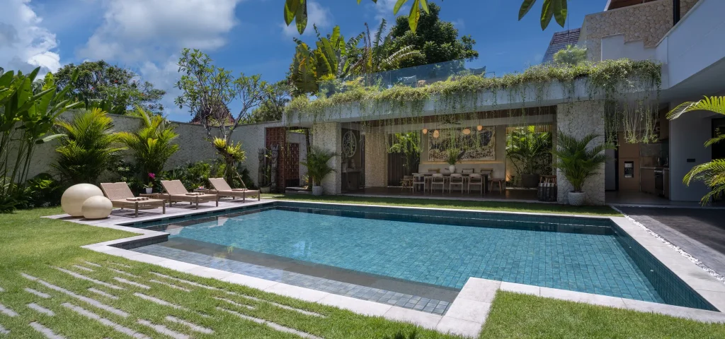 Villa Photo – Villa Pantai Indah – Bali – Indonesia Rooftop deck of Villa Pantai Indah with sun loungers and sunset views in Canggu Bali