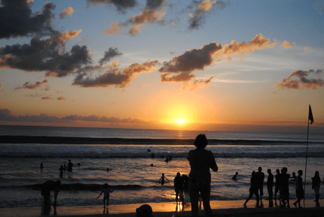 Seminyak Beach in the afternoon with orange sunset