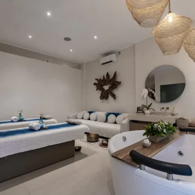 Jaen Spa in Ubud, Bali, featuring a tranquil tropical garden setting, open-air massage pavilions, and a serene atmosphere for wellness and relaxation.