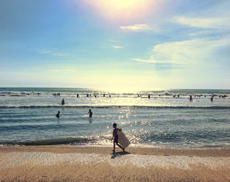 surfing holiday in Bali on sunny day