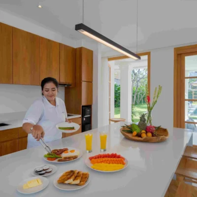 Amenara_Kitchen with cook cooking_11zon Bali Villas Kitchen
