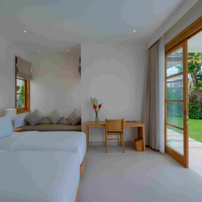 Amenara_Poolside bedroom with window sofa_11zon Bali Villas Bedroom