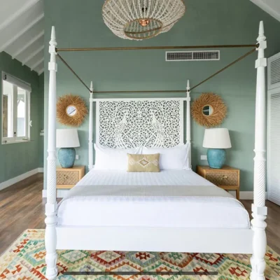 Four poster bedroom has a large terrace with sunset views Villa Kasianda House - Villa Gallery
