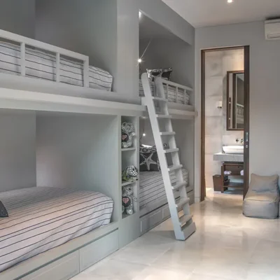 Seseh-Beach-Villa-II-Kids-bedroom-with-view-to-ensuite-1 Seseh Beach Villa Estate - Villa Gallery