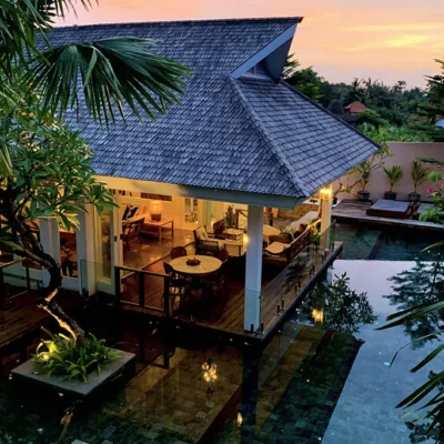 The swimming pool with safety fence is lit by fiber optic lights Villa Kasianda House - Villa Gallery