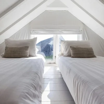 Upper guest suite has 2 single beds at the top of the ladder Villa Kasianda House - Villa Gallery
