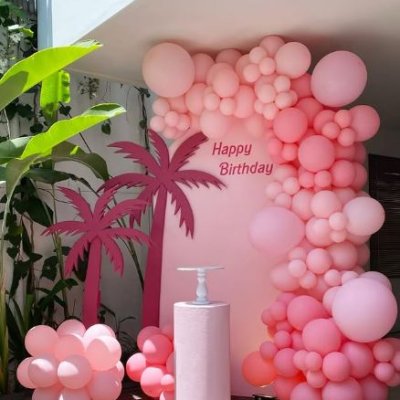 Birthday decorations in a villa, featuring colorful custom balloons, banners, and festive setups for a celebratory atmosphere.