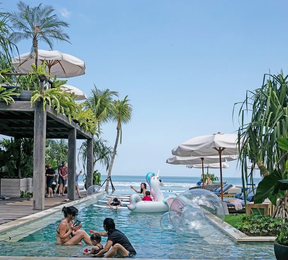 Luxury family villas in Seminyak, Bali, featuring private pools, spacious tropical living areas, and modern Balinese design for a comfortable family stay.
